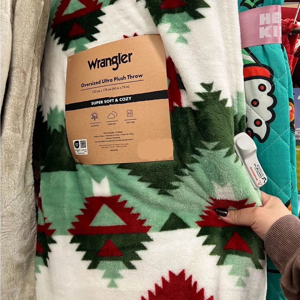 Wrangler tribal  pattern throw in holiday colors